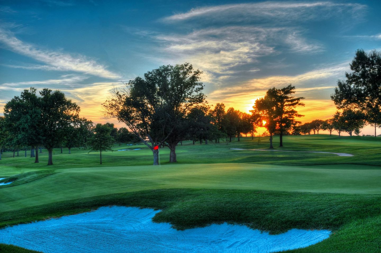 Golf course fairway at golden hour